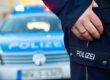 Polizeiauto und Polizist